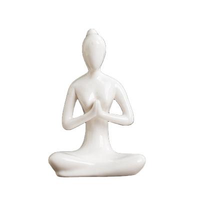 China Simple modern wholesale handmade white ceramic yoga open statue for home decor for sale