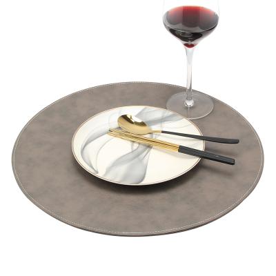 China Sustainable Leather Customized Eco Friendly Washable Round Fashion Ins Nordic Style Dining Place Mats For Kitchen Table for sale