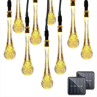 China Outdoor Solar Powered Icicle Lights Water Drop Solar Powered Electric String Fairy Lights For Holiday Party Curtain Lights for sale