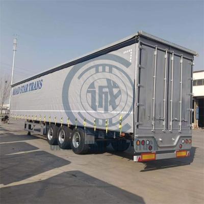 China Truck Trailer WABCO Braking Tires 3 6 Axle SAF Axle 40 Ton Loading Side Curtain Semi Trailer for sale