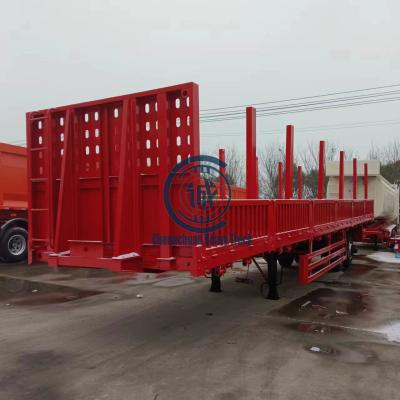 China Truck Trailer 2 Axles 50 Tons Loading Capacity Single Side Wall Semi Trailer Suspension With Stakes for sale