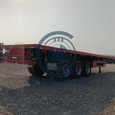 China Truck Trailer 3 Axles BPW Alxe OEM Customization Service Design Flatbed Semi Trailer New With Lock Sets for sale