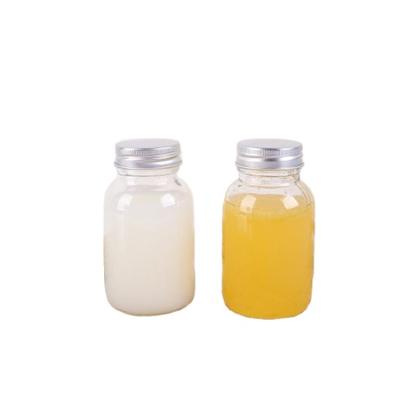 China ECO New Arrival Daily Necessities Glass Fruit Juice Bottle With Screw Lids for sale