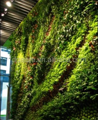 China Custom green home decorative fake wall plant fiber decor artificial grass wall uv/water proof plant for sale