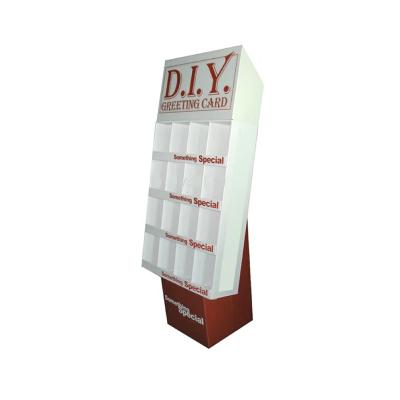 China Eco-friendly Custom Supermarket promotional Paper Floor Display stand Pos Cardboard Display Shelves for Snacks Candies for sale