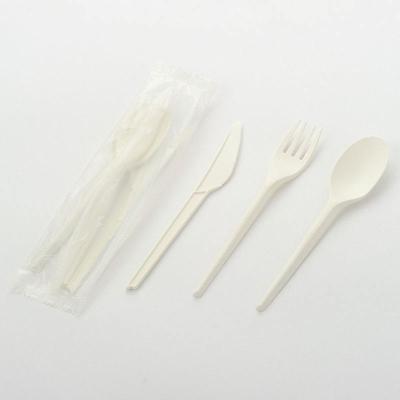 China Disposable CPLA Fork Spoon Knife Plastic Cutlery Set With Napkin for sale