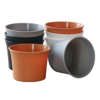 China Cheap imitation ceramic plastic flower pots and planters simply wholesale for sale