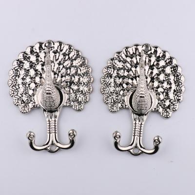 China Traditional Curtain accessories ethnic wind metal iron art peacock curtain wall hook hook curtain wall hook for sale