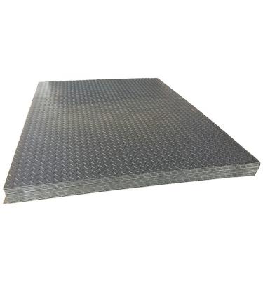 China Hot Rolled Construction S275jr Mild Steel Carbon Plate Coils Checkered Iron Strip For Building Material for sale