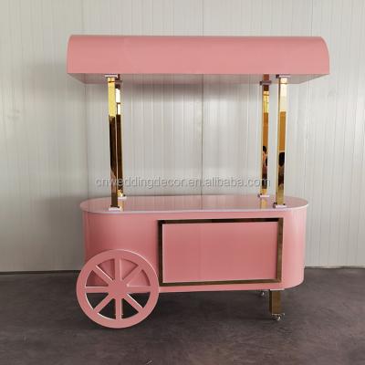 China Event Decoration Craft Sweet Pink Wedding Candy Carts Display for sale