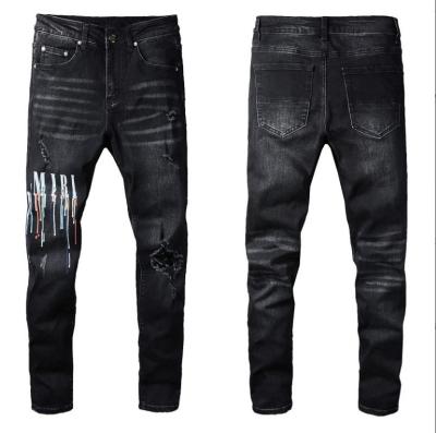 China Waterproof Wholesale New Style Men's Distressed Destroyed Badge Pants Art Patches Skinny Jeans Slim Trousers Men Denim Jeans for sale