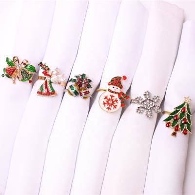 China High End Elk Viable Garland Christmas Tree Bell Snowflake Christmas Gold Napkin Towel Rings Hotel Decoration Metal Towel Rack for sale