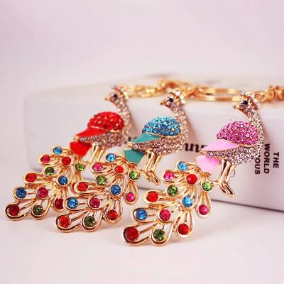 China Promotion Gift Creative Crafts Seven Color Peacock Key Chain Women Bag Accessories Phoenix Key Ring Pendant for sale