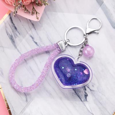 China Transparent Promotion Gift Fashion Sequins Heart Key Chain Quicksand Key Chain Pu Car Lover Car Key Chain Girl Gift for sale