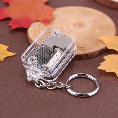 China Promotion Gift Children 18 Tones DIY Music Box Key Chain Plays Baby Musical Instrument Practical Music Key Chain for sale