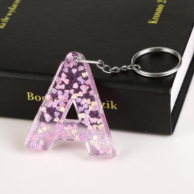 China 1PC Promotional Gift 1PC English Word Keychain 26 Word English Letter Glitter Key Chain Resin A Q Handbag Charms For Woman for sale