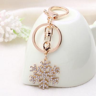 China Fashion Hot New Fashion Snowflake Style Promotion Gift Key Chain For Women Jewelry Gift Gold Key Chain for sale