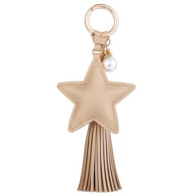 China Luxury Bag Creative Cute Leather Pendant Tassel Keychain Promotion Gift PU Star Car Key Chains Leather Key Chain for sale