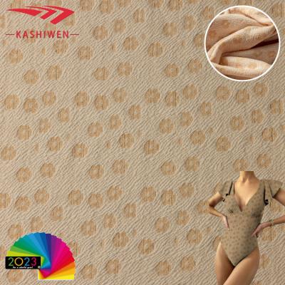 China Breathable Simple Style Floral Knitted Jacquard Fabric Polyester Spandex Swimwear Jacquard Fabric Nylon Bikini Dress for sale