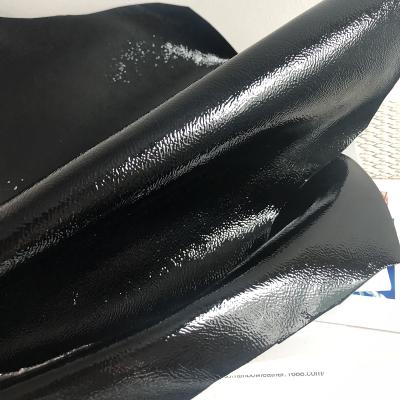 China Durable wrinkled black color patent cowhide shinny patent leather 1.2-1.4mm thickness calf for sale