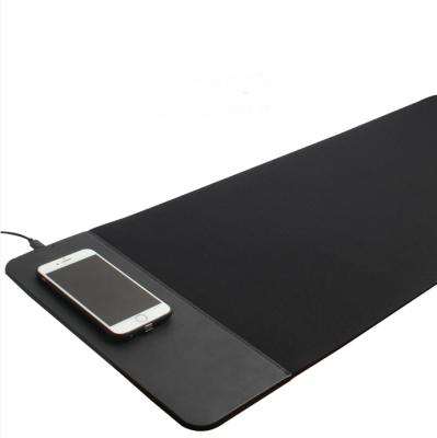 China Eco-Friendly Multifunctional PU Leather Heated Charger Table Desktop Hot Writing Wireless Mouse Pads for sale