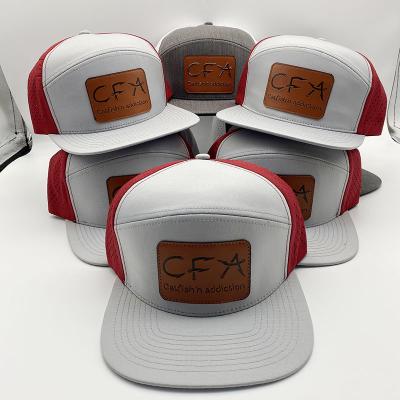 China COMMON high quality custom trucker cap with leather patch Perforated melin hat waterproof hat 5 panels for sale