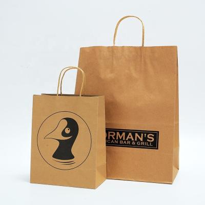 China Recycled Materials Wholesale Grocery Fancy Gift In Stock Kraft Paper Packaging Bag with Handle Cheap Price Business Shopping Take away Bag for sale