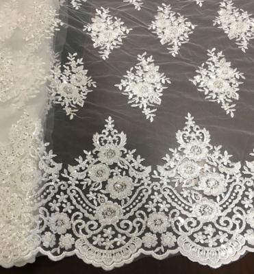 China High End White Bridal Machine Beaded Embroidery Tulle Lace Fabric Shrink-Resistant For Dresses Or Wedding for sale