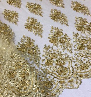 China New Design Shrink-Resistant High Quality Machine Beaded Heavy Embroidered Dress Lace Wedding Sequin Lace Fabric For Bridal for sale