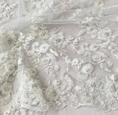 China High Quality Shrink-Resistant Bridal Beaded Lace Fabric Hand Embroidered Tulle Fabric For Heavy Wedding Or Bridal Dress for sale