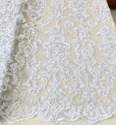 China High Quality Shrink-Resistant All Over White Heavy Sequin Beaded Embroidery Bridal Lace Fabric / Luxury Wedding Dress Fabric for sale