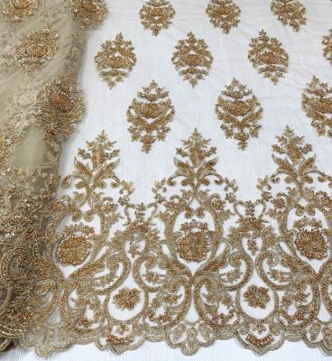 China New Arrival Gold Shrink-Resistant Metallic Embroidery Lace Beaded Sequins Embroidered Tulle Fabric For Heavy Dress Or Bridal for sale