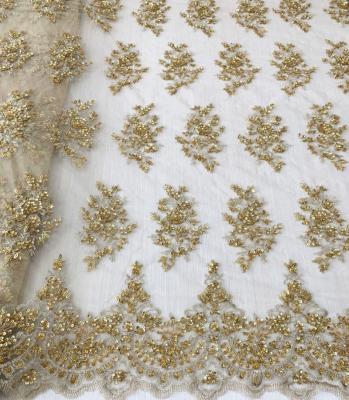 China Best Selling Heavy Gold Sequin Hand Embroidery Lace Beaded Tulle Fabric Embroidery Designs For Dress Or Bridal Shrink-Resistant for sale