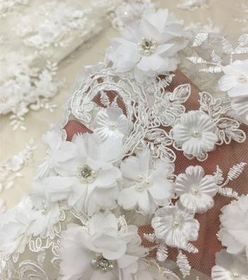 China Best Selling Shrink-resistant 3d lace fabric cord bridal lace beaded embroidery fabric with flower applique and stones for wedding dress for sale