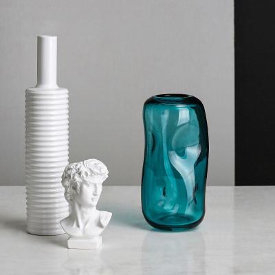 China Decorative Chinese style minimalist luxury swollen irregular color hand CIA vase home decor glass vase for sale