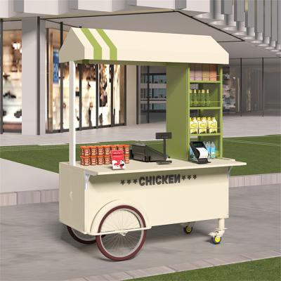 China Hoog op maat gemaakte kleuren Mini handpush straat snack verkopen trolley fast food stand cart met grote opslagcapaciteit Te koop