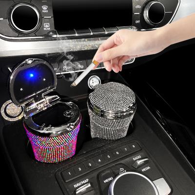 China New Diamond Car Ashtray LED Light Morden Portable Ashtray Cigarette Holder Covered Wagon Bling Smokeless Auto Accessories For Girl Woman for sale