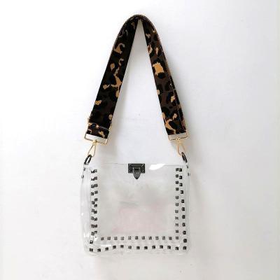 China Adjust Variable Strap Transparent PVC Clear Cross - Body Bag Stadium Bag WITH RIVETS for sale