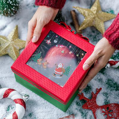 China Disposable Christmas gift box sky and earth cover open window apple transparent gift box printing golden logo for sale