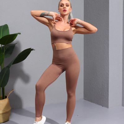 China New Sports 2022 Knitted Tight Seamless Yoga Suit Breathable Spring Bra Hip Lift Pants Fitness Yoga Clothes For Women for sale