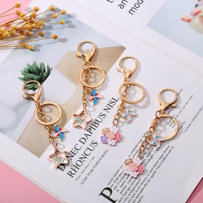 China New Cute Cartoon DIY Cherry Notes Pentagram Windmill Key Chain Advertising Gift Key Chain Pendant Wholesale Wedding for sale