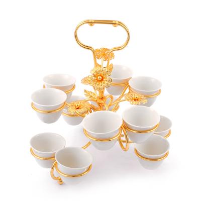 China Custom Christmast Ornament Decor Christmas Home Tea New 12 Ceramic Cups With Gold Plated Iron Frame for sale