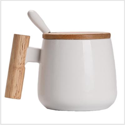 China Viable Wholesale Creative Gift Set Coffee Mug With Wood Handle Retro Ceramic Mug With Spoon for sale