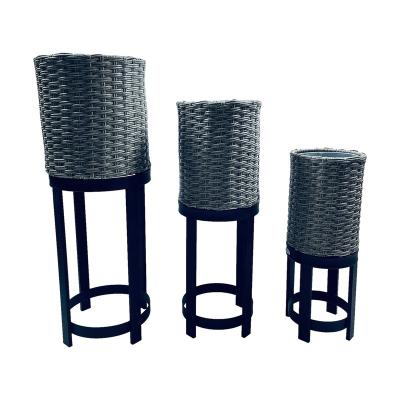 China Modern Stylish Garden Plant Stand Holder Shelf Metal Flower Planter With Rattan Wicker Weaving Pot for sale