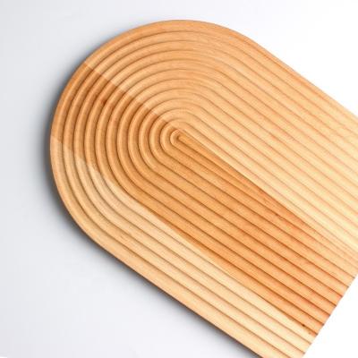 China Solid wood beech bread board shelf fruit board kitchen table decoration disposable Nordic geometric dining wooden cutting board for sale