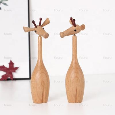 China Giraffe crafts from Europe and Nordic wooden animal arts and wood handcrafted products can be 360 ​​degrees of activity for home decor for sale