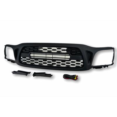 China Spedking 2001-2004 ABS Car Grill Bumper Guard With Lights For Toyota Tacoma for sale