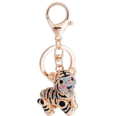 China Wholesale Gift In Exquisite Stock And Metal Accessory Rhinestone Lion Stone 3D Fashion Bag Charms Women's Key Chain for sale