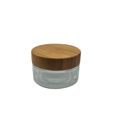 China 5g cosmetic 10g 15g 20g 30g 50g 100g frosted transparent cosmetic cream jar with cover glass pp bamboo PET for sale