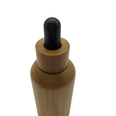 China Customized Cosmetic High Quality 1oz 2oz 4oz 15ml 30ml 50ml Plastic All Essential Oil Bottle Bamboo Packing Container for sale